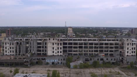 4k drone view of abandoned manufacturing plant in detroit-26