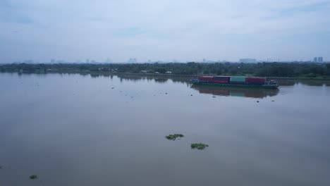 Container-boat-on-Saigon-river-from-aerial-view-on-sunny-day