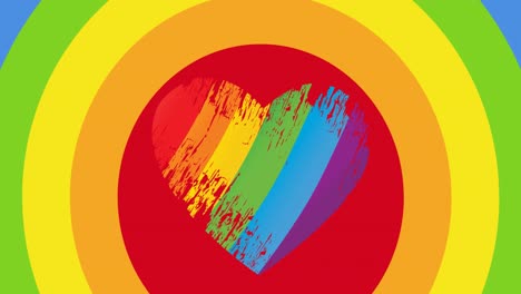 animation of rainbow heart over rainbow stripes