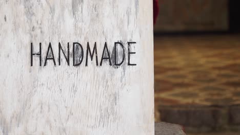 handmade sign on wooden board