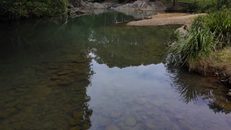 Light-Reflection-At-The-Pristine-Water-Of-Currumbin-Rock-Pools-At-Queensland,-Australia