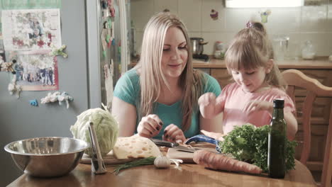 mother and daughter cooking together