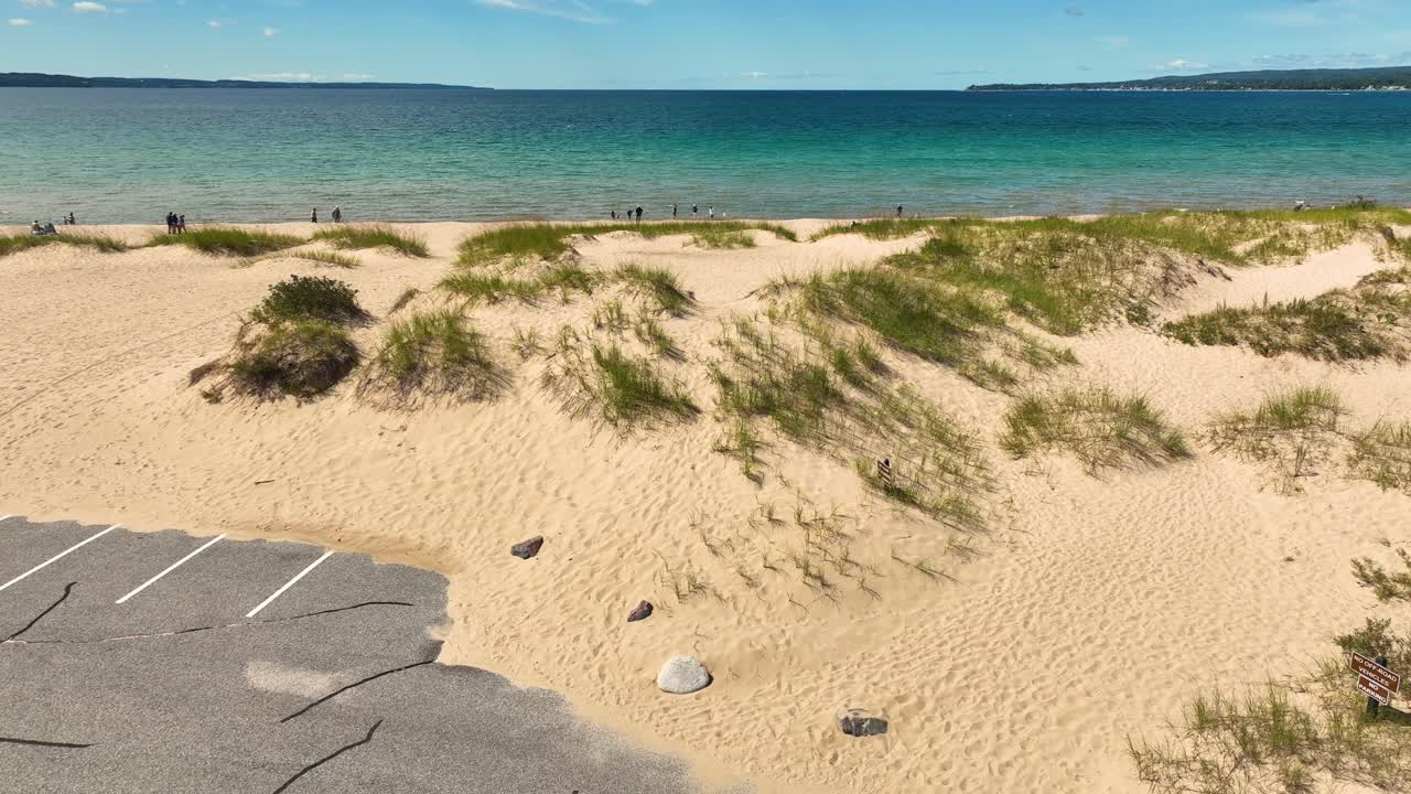 Drone landing on the cement after filming the beach