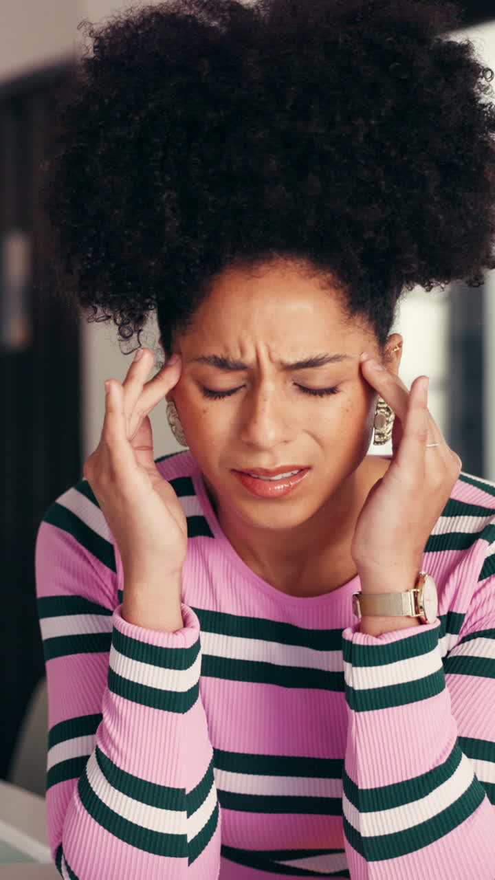 Young Woman Suffering from Headache and Stress