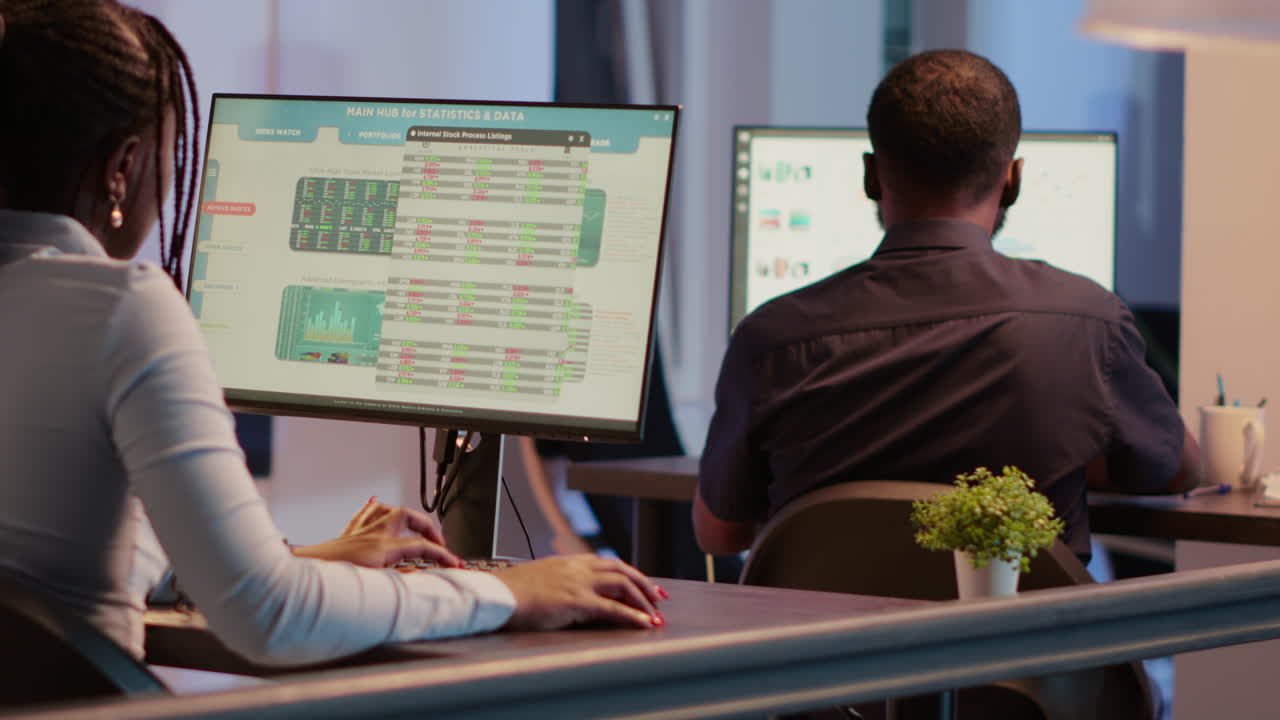 People working at desks using computers