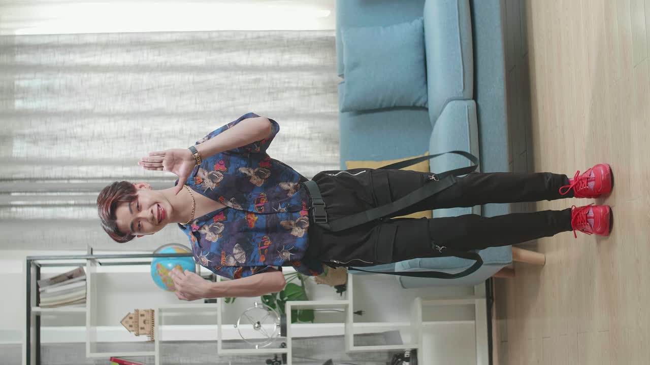 Stylish Man Dancing in Living Room