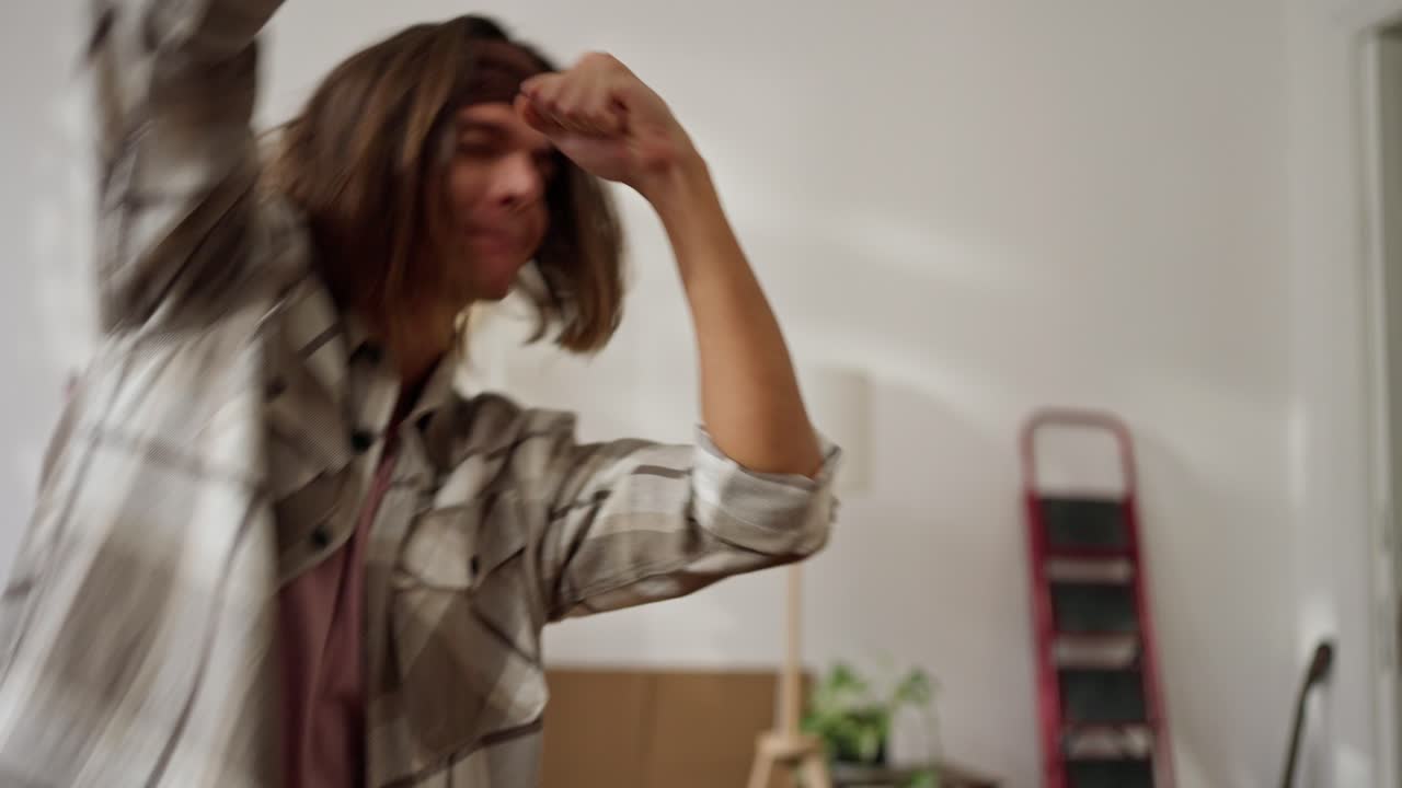 Young Man Dancing in a Room