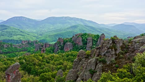 belogradchik rock formations in beautiful bulgarian forests landscape, drone shot