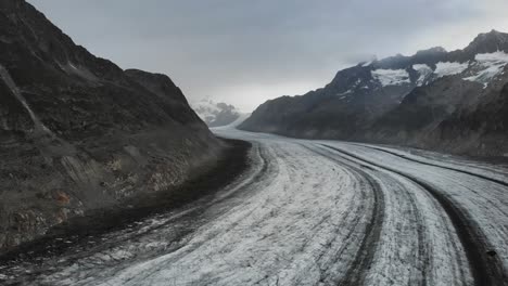 flyover towards the middle of the longest glacier in the alps - the aletsch glacier in valais, switzerland
