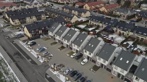 aerial view of small european city with modern residential suburb neighborhood