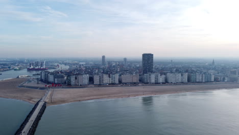 aerial dolly in of ostend city by the north sea in belgium