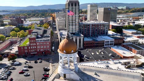 aerial over american flag atop building in chattanooga tennessee