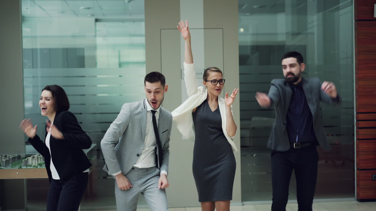 Business Team Dancing in the Office
