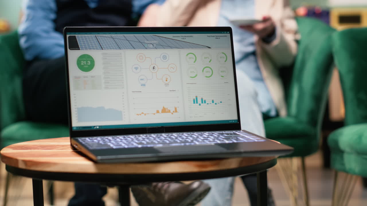 Photovoltaic panels system software running on laptop screen,
