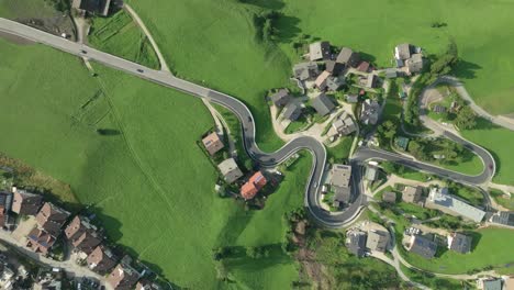 An-overhead-footage-of-the-winding-roads-cutting-through-the-various-parts-of-the-La-Val-village-in-the-Italian-Dolomites-mountains