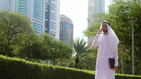 man with arabic clothing in the street