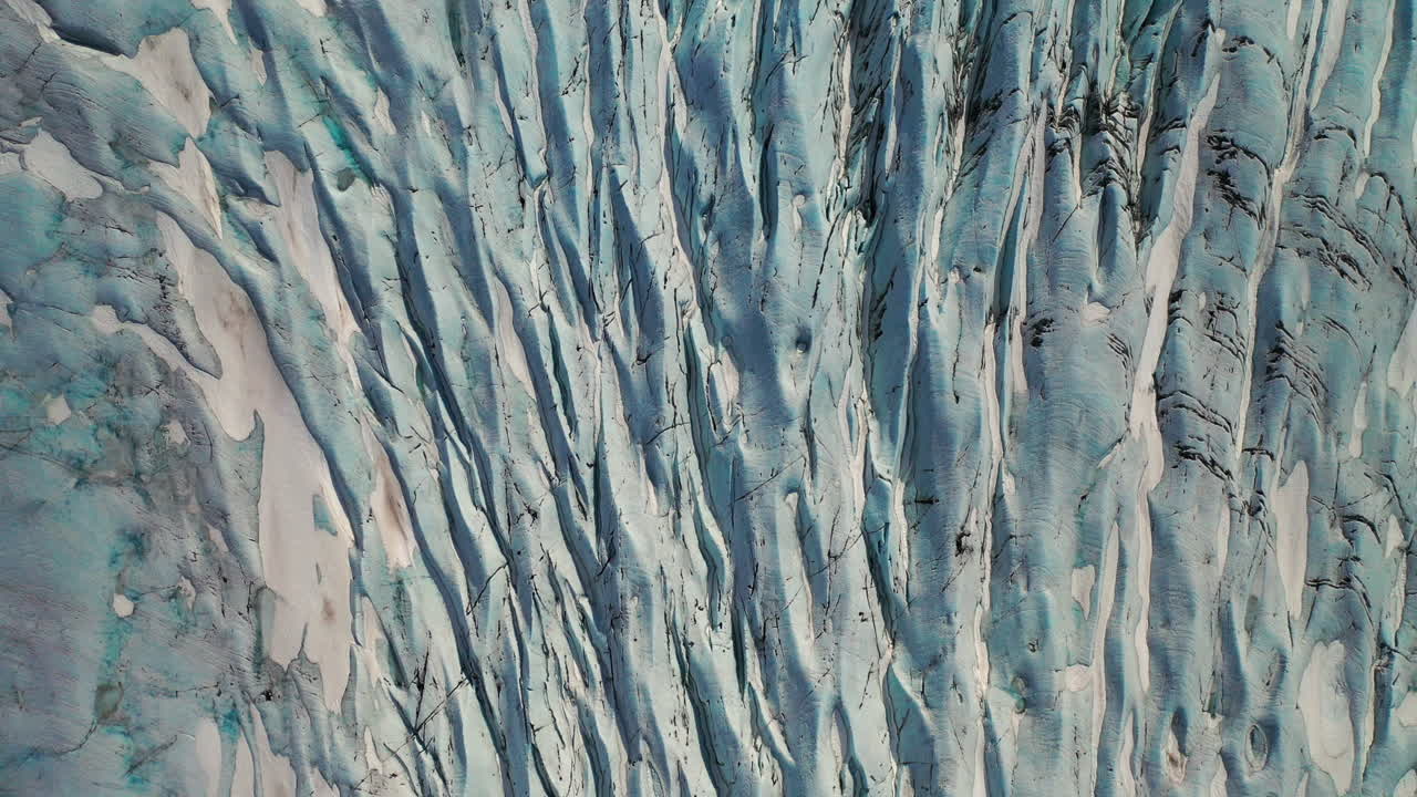 Beautiful Carvasses Of Skaftafellsjokull Glacier Outlet In South Iceland. - aerial top drone