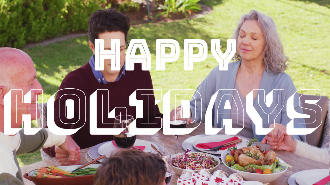 Animation of christmas greetings text over caucasian family at christmas table