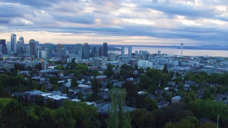 wide aerial shot pulling away from seattle's dense downtown district, circa 2016