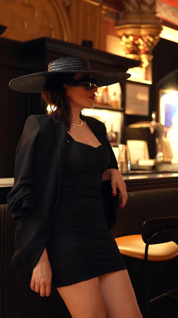 Woman in hat and sunglasses