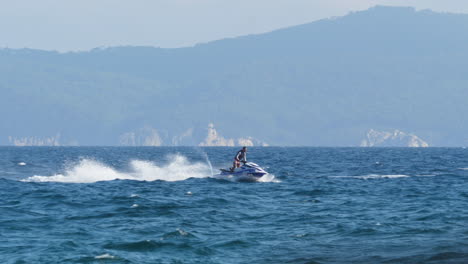 man on a jet ski mediterranean coast slow motion