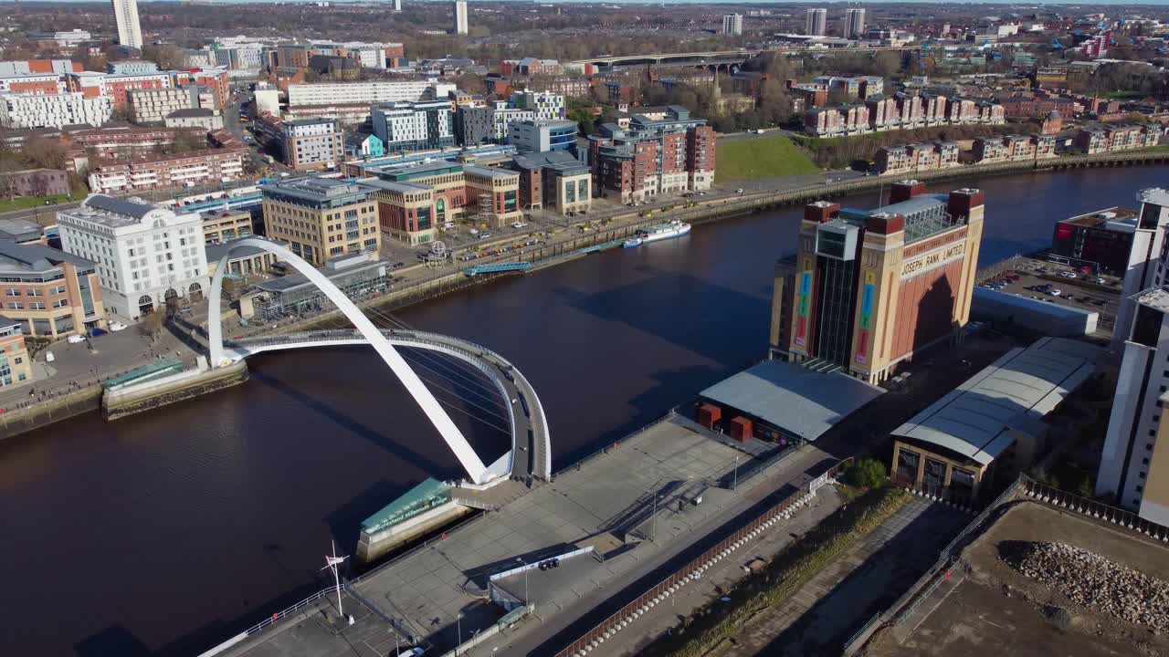 Aerial view of Gateshead Millennium Bridge and Baltic Centre on Newcastle Quayside - England