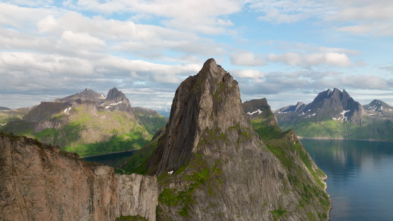 Imposing Segla mountain with popular hiking trails at Fjordgard, Norway. Aerial