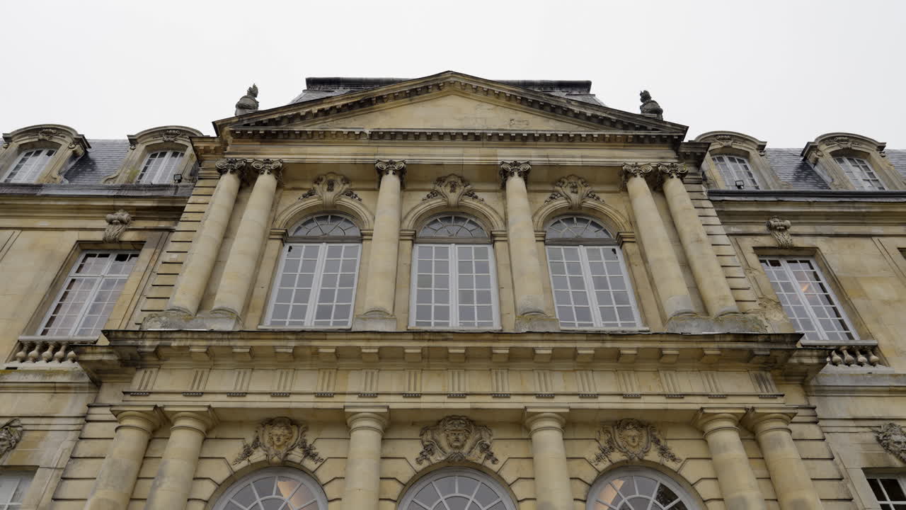Ornate Historic Building Facade with Classical Columns