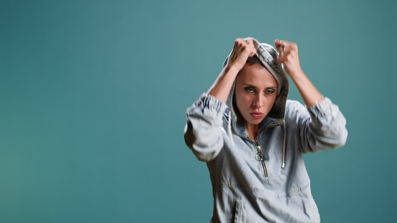 Woman Punching with Hoodie On