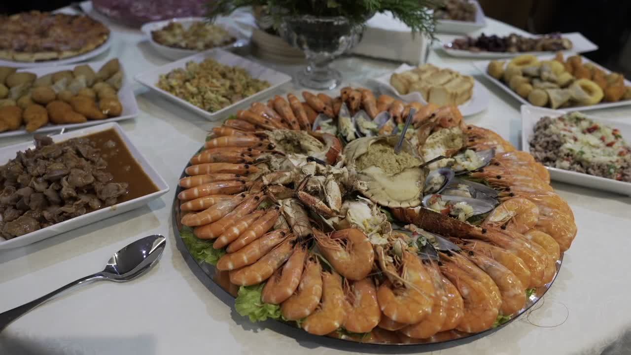 Elegant seafood platter with shrimp, crab, and mussels on a festive dining table