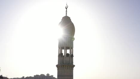 mosque tower minaret in anata refugee camp,on blue sky jerusalem-aerial