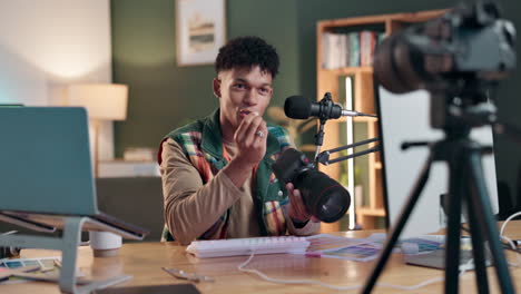 man recording video with camera and microphone