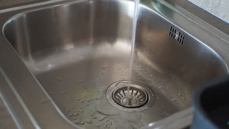 kitchen sink with running water