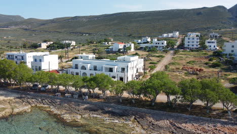 Kythira-island,-Greece:-Aerial-view-of-a-white-mansion-in-Diakofti-village-on-a-sunny-summer-day