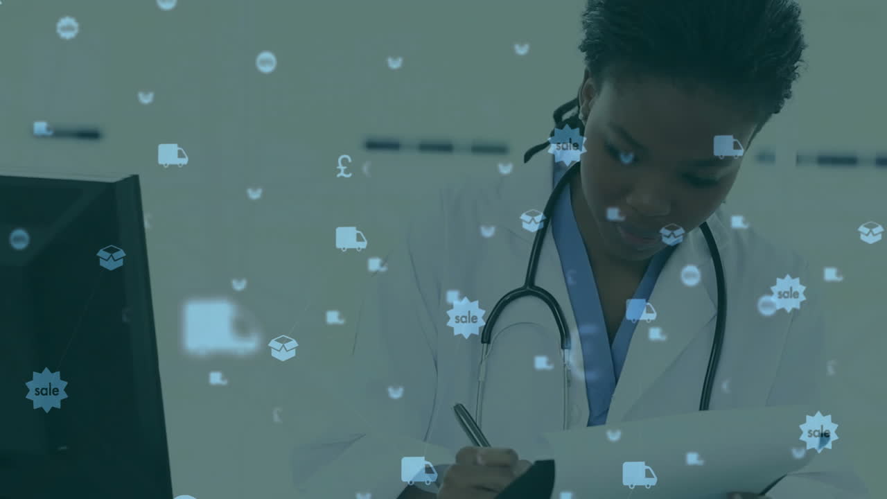 Female doctor writing notes at clinical desk while digital icons floating showing finance data