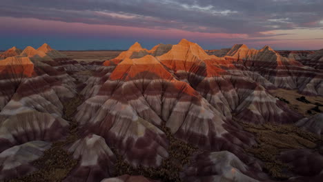 vibrant sunset colors over the striped badlands landscape