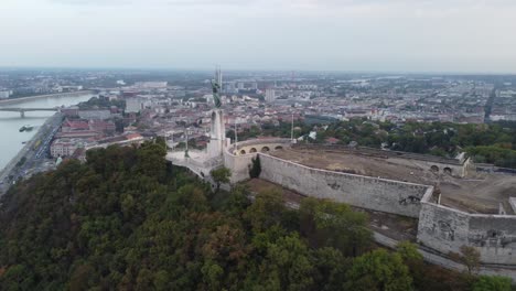 Citadella-of-Budapest-over-the-hills-of-Gellert,-all-across-Danubio-river-and-Budapest-city