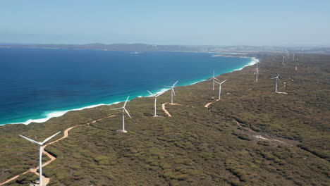 drone shot of a windmills, on the coast of albany, australia - trucking, aerial view