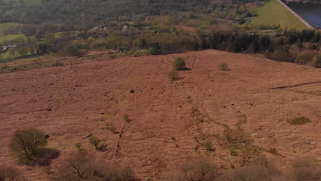 Drone-travelling-towards-a-Peak-in-the-Peak-District-while-panning-up-from-Bamford-Edge-Alternative-Angle-shot-in-4K