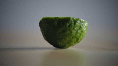 half-of-a-lime-on-the-table-closeup-macro