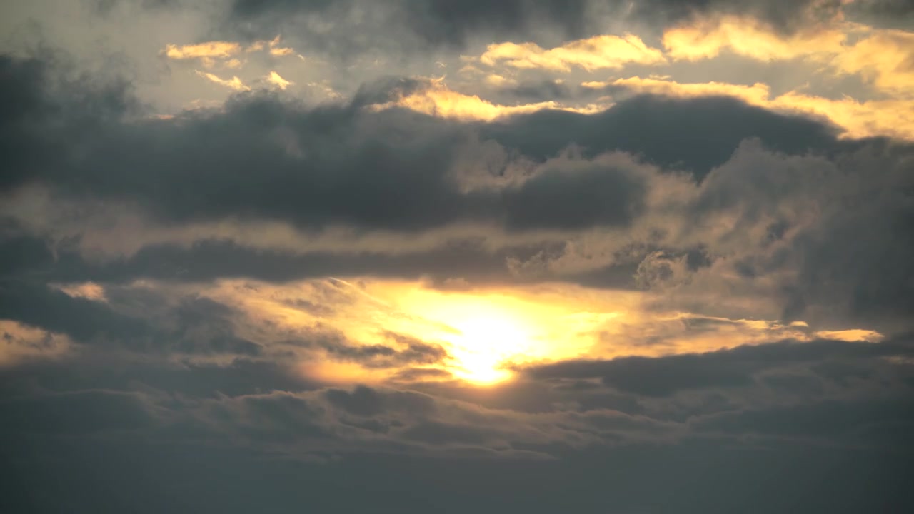 Golden Sunset Clouds Moving Across the Sky