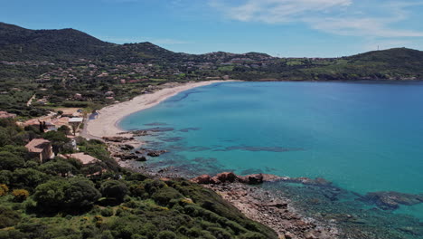 aerial view of corsican beach with clear blue water