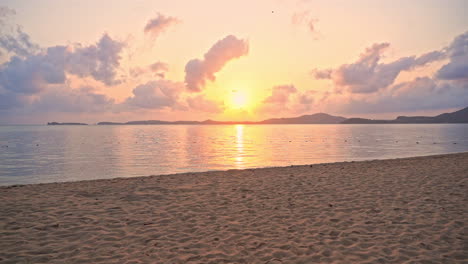 sunset sunlight above empty tropical beach, serene exotic landscape, full frame