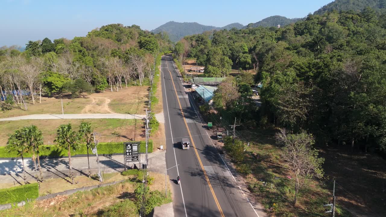 Drone perspective of White Sand Beach village, Koh Chang. Sunny morning aerials of Thailand's coastal beauty on the island of Koh Chang