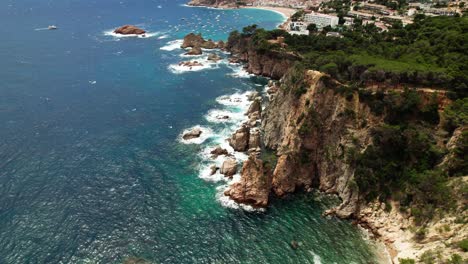 Idyllic Scenery Of Ocean And Sea Cliffs In Tossa de Mar, Spain - Aerial Drone Shot