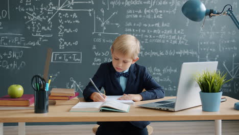 boy student studying in classroom