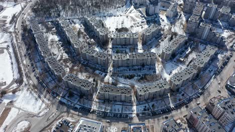 aerial drone shot of pattern of high-rise old soviet russian buildings in vilnius