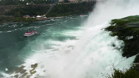 niagara falls new york and maid of the mist boat - high angle