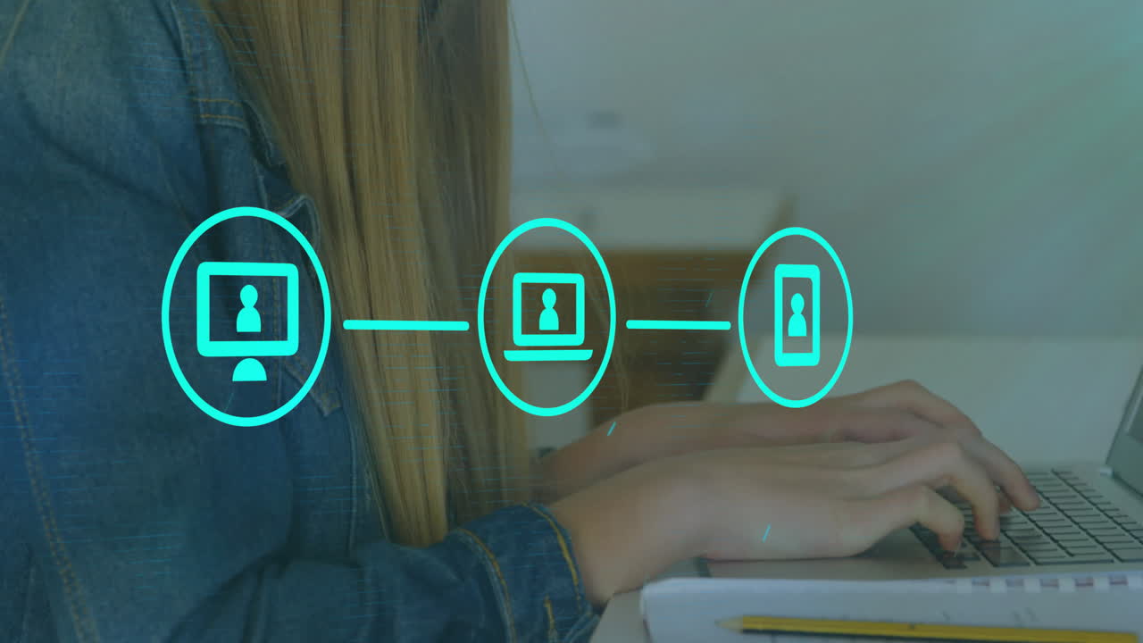Typing on laptop with digital network icons overlayed, person creating animation