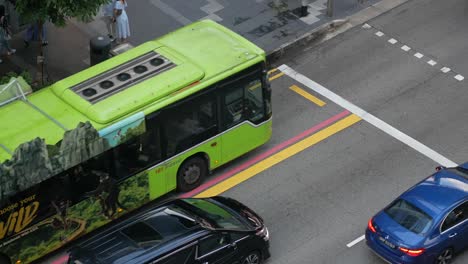 city street scene with traffic and bus